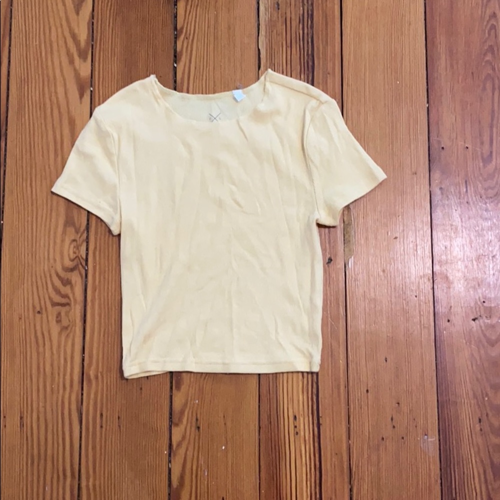 pastel yellow tight t-shirt